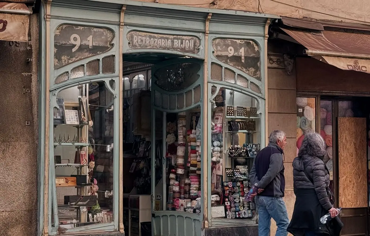 An art nouveau shopfront with period lettering